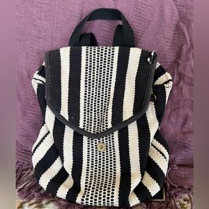 Woven black and white backpack